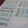 Custom Printed Contour Cut Paul's Pool and Spas Business Stickers 